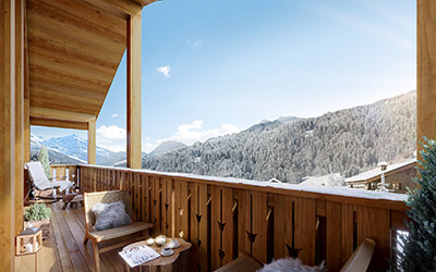 3D graphics of a chalet balcony with mountain view